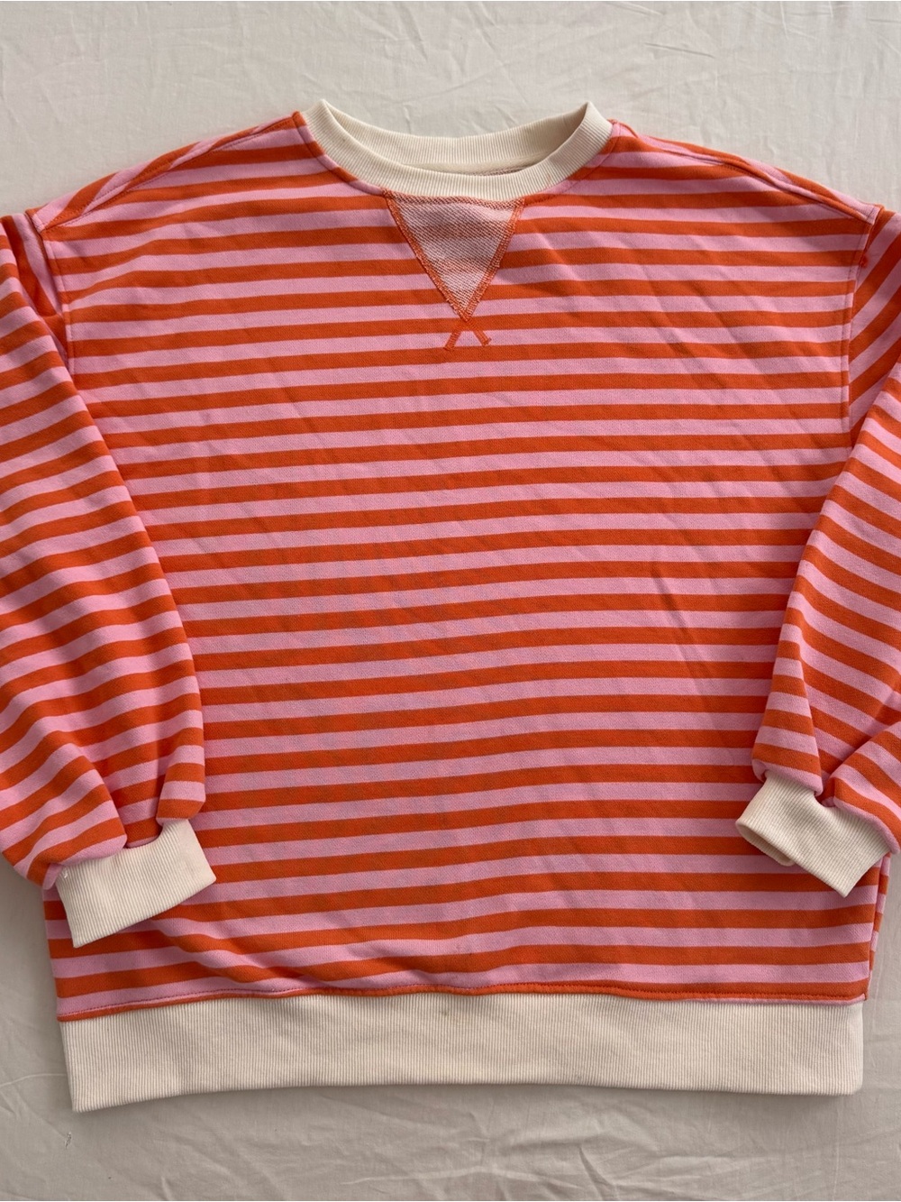 Orange + pink striped crewneck sweatshirt